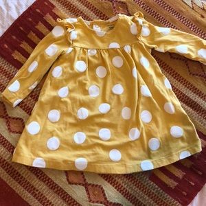 Yellow polka dot dress with shoulder ruffles
